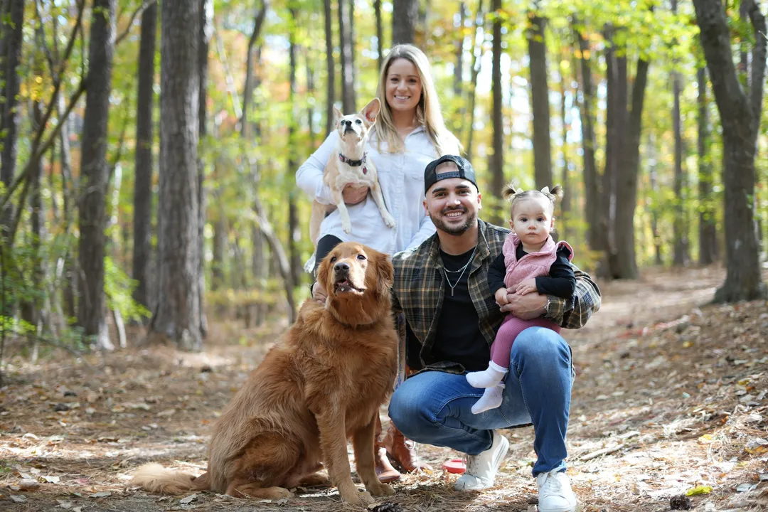 The family gathered low on the forest floor, Jax front and center